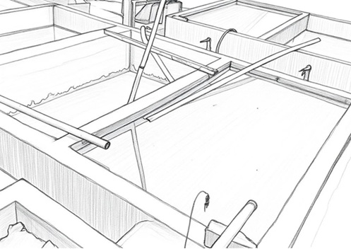 沈殿槽で土を沈ませて水と分離する工程